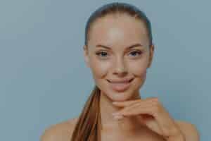 Surgeons may use grafts from the patient's cartilage or synthetic materials to build up a flat nose structure during the procedure.