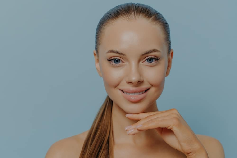 Surgeons may use grafts from the patient's cartilage or synthetic materials to build up a flat nose structure during the procedure.