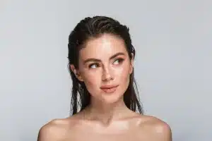 Elegant woman with youthful skin and subtle smile